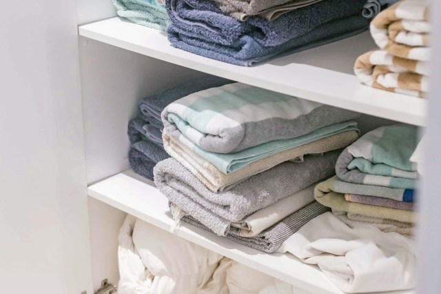 Towels organized in a closet