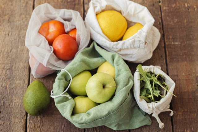 Vegetables and fruits in grocery bags