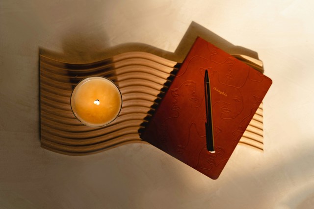 A journal and candle