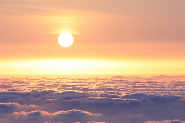 The sun above clouds