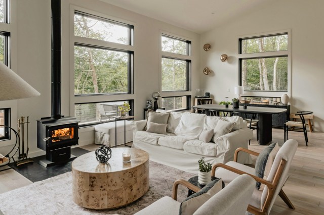 A living room with lots of windows and natural light