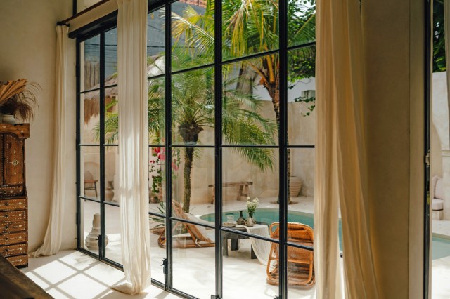 A window overlooking a pool