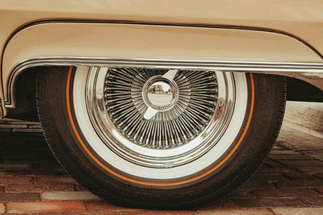 A zoomed in view of a vintage car tire 