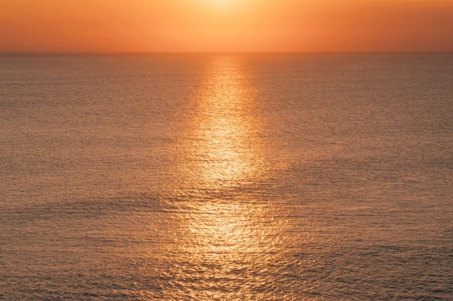 The sunset reflecting on the ocean