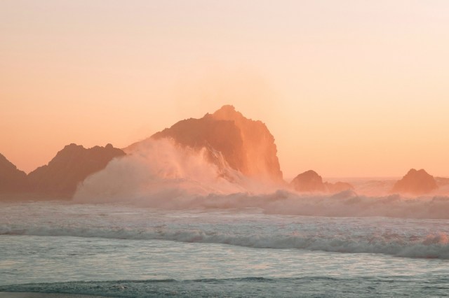 Ocean waves crashing on a rock 