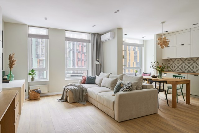 A large living room with windows