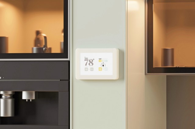 A thermostat mounted on a wall