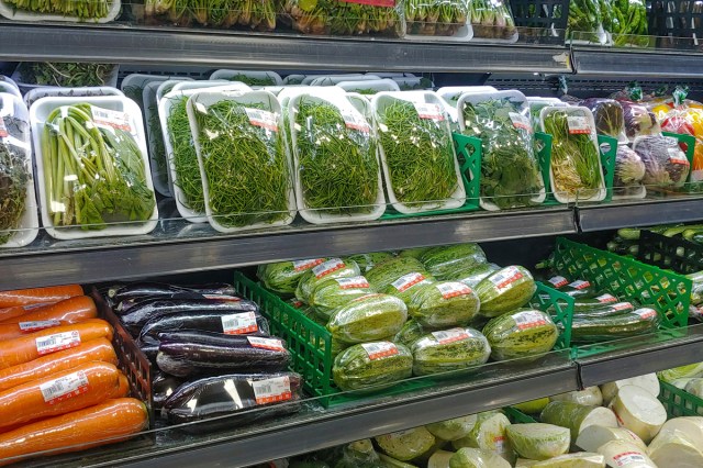 Rows of produce packaged in plastic